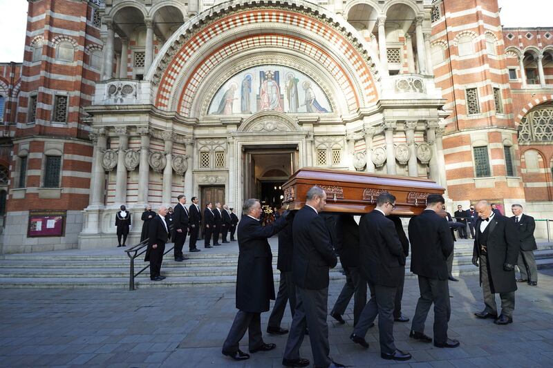 Pall bearers with the coffin of Amess outside Westminster Cathedral for a requiem mass, in November 2021. AP Photo