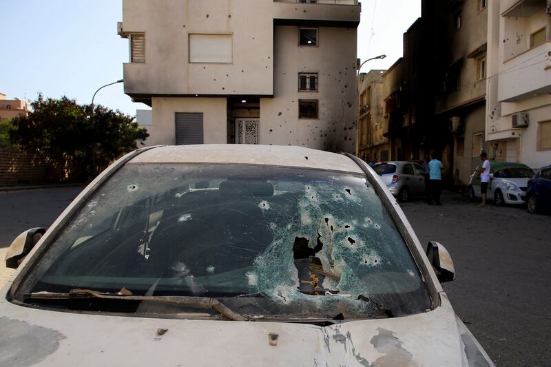 A car's smashed windshield.  Reuters