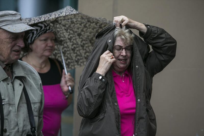 Abu Dhabi residents woke up to a gloomy and rainy weather on Wednesday morning, March 26 2014. Silvia Razgova / The National