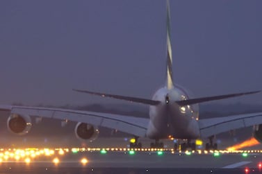 The car gives chase as the Emirates A380 prepares for takeoff. Courtesy Emirates