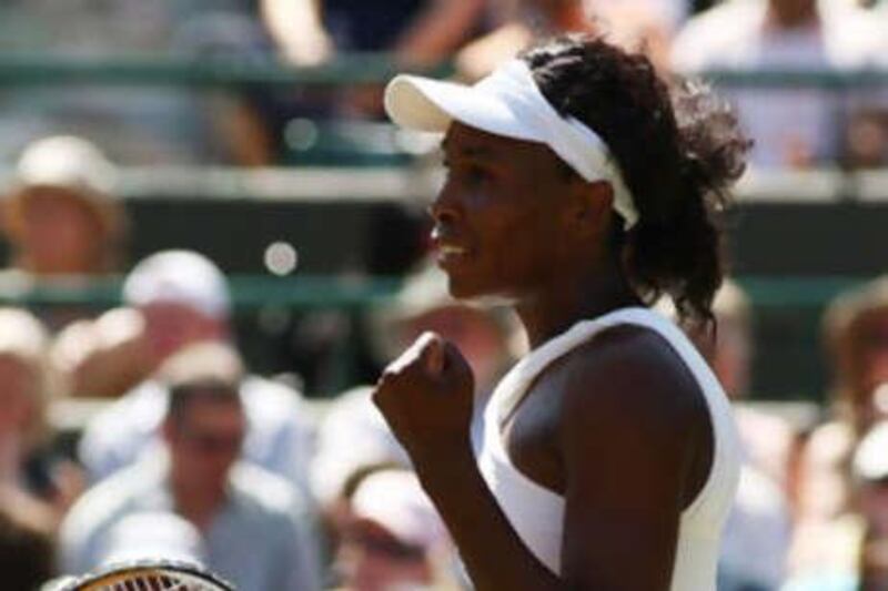 Defending champion Venus Williams is on course for another Wimbledon final against sister Serena.