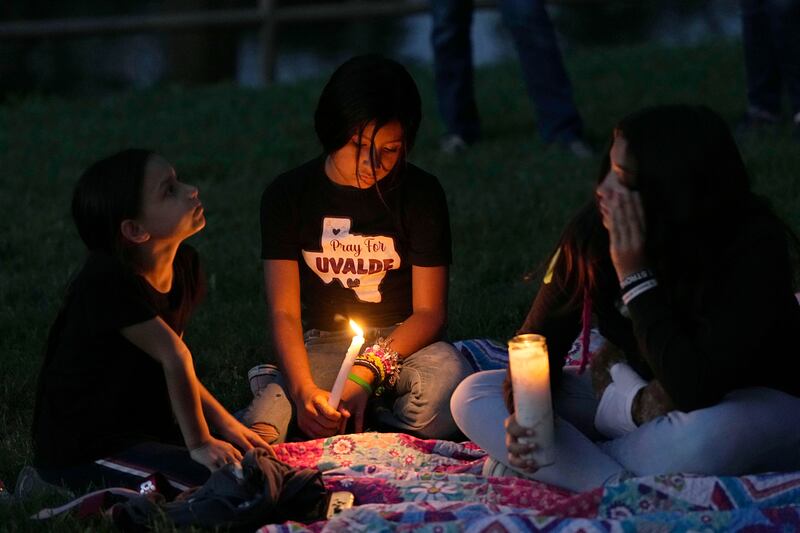 Friends and family gather for a vigil in Uvalde, Texas on Wednesday, one year after a gunman killed 19 children and two teachers inside a classroom. The task for those seeking to support this community is both vast and complex. AP