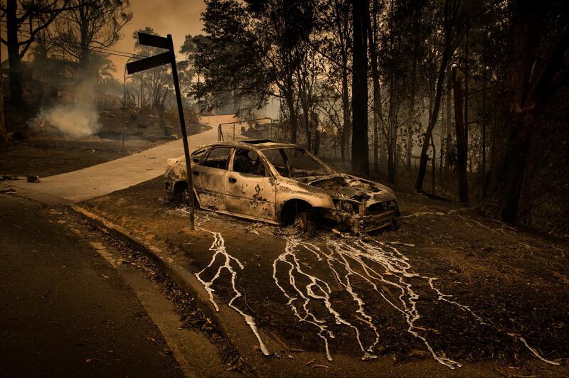 A photo by Matthew Abbott showing aluminum, which melts at 660.3℃, has streamed from a burning car in Conjola Park, a town where bushfires razed more than 89 properties, in New South Wales, Australia. Matthew Abbott / Panos Pictures for The New York Times
