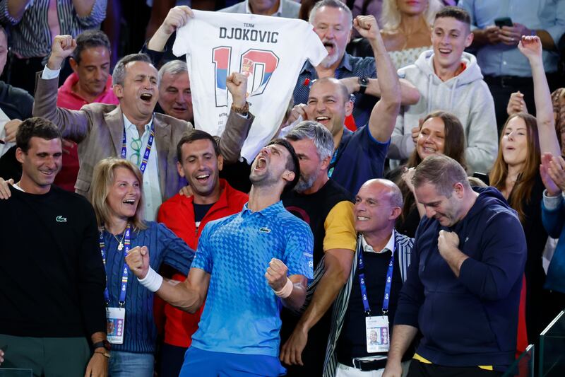 Novak Djokovic celebrates with his team including his mother, Dijana, second left, after defeating Stefanos Tsitsipas. AP 
