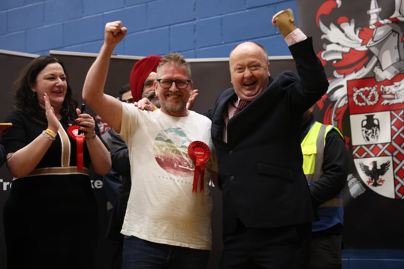 Stephen Blakemore and Adrian Knapper of Labour celebrate after wining Birches Head and Northwood in Stoke-on-Trent. Getty Images