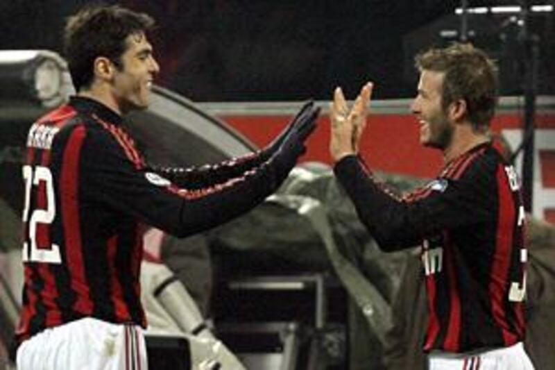 Beckham, right, celebrates his goal with Kaka.