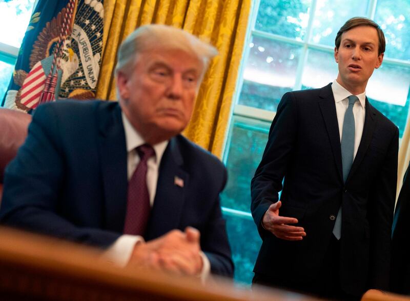 US President Donald Trump listens Senior Advisor to the President Jared Kushner in the Oval Office of the White House in Washington, DC, on September 11, 2020. Trump announced Friday a "peace deal" between Israel and Bahrain, which becomes the second Arab country to settle with its former foe in the last few weeks. / AFP / ANDREW CABALLERO-REYNOLDS

