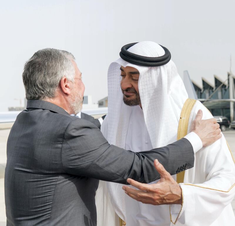 ABU DHABI, UNITED ARAB EMIRATES - July 27, 2018: HH Sheikh Mohamed bin Zayed Al Nahyan, Crown Prince of Abu Dhabi and Deputy Supreme Commander of the UAE Armed Forces (R), receives HM King Abdullah II, King of Jordan (L), at Al Bateen Airport.

( Rashed Al Mansoori / Ministry of Presidential Affairs )
---