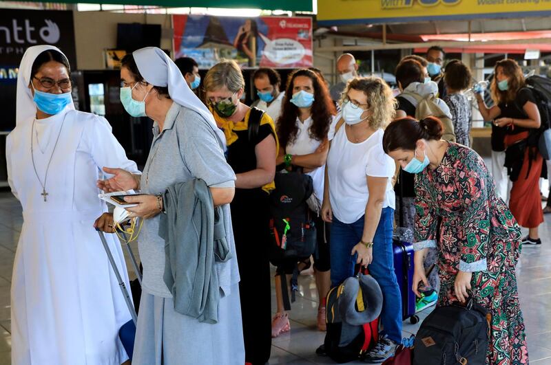 Portuguese nationals prepare to fly to Lisbon at Nicolau Lobato International Airport in Dili, East Timor. According to media reports, more than 200 Portuguese working in East Timor, will depart for Lisbon.  EPA