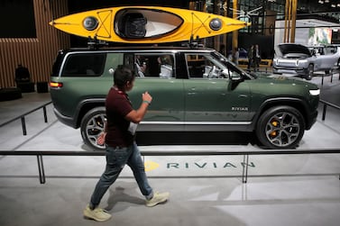 A Rivian electric SUV on display. Global car sales are set for a 15% drop in 2020, double the decline during the 2008-09 global financial crisis, according to the IEA. Reuters