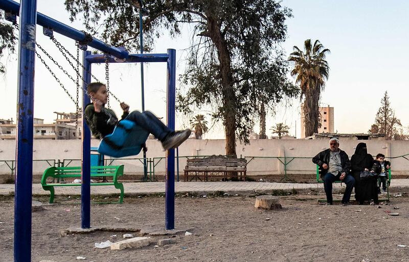 A child plays in a park in Raqqa, northern Syria. AFP