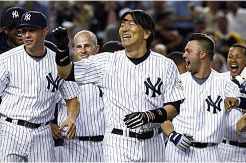 A homer by the Yankees' Hideki Matsui, centre, was the clincher.