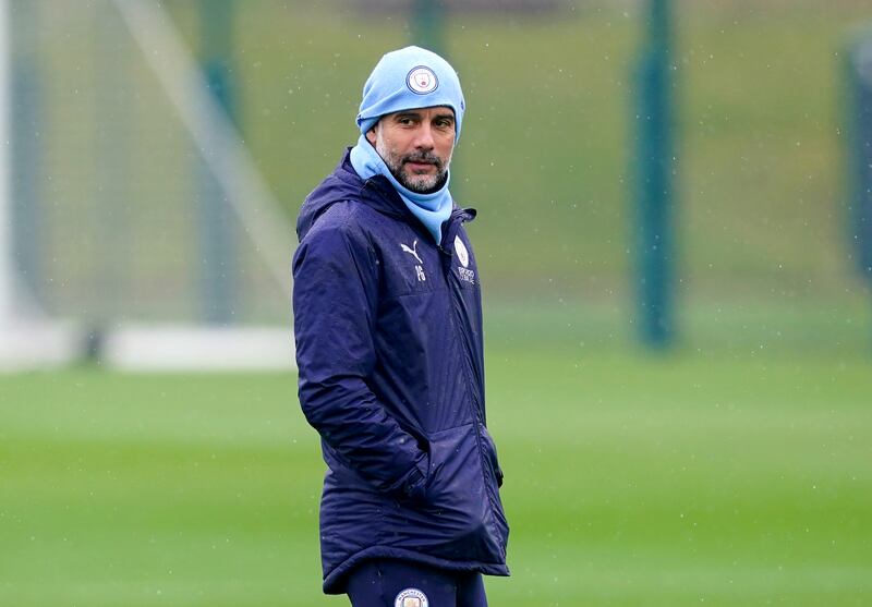 Manchester City manager Pep Guardiola oversees a training session at the City Football Academy. PA