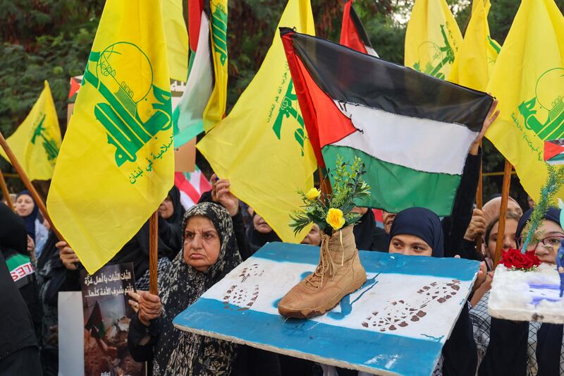 Hezbollah supporters march in solidarity with Palestinians in Gaza. AFP