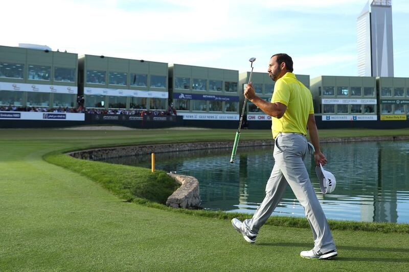 Sergio Garcia acknowledges the crowd on the 18th green during the final round of the Omega Dubai Desert Classic. Warren Little / Getty Images