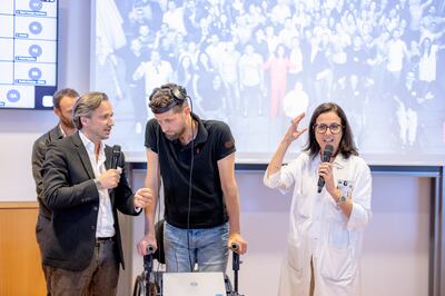 Gert-Jan Oskam with the EPFL scientists Gregoire Courtine and Jocelyn Bloch. PA