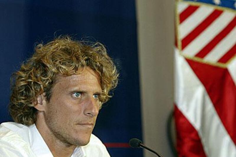 Forlan attends a news conference in Madrid ahead of his medical for Inter Milan.