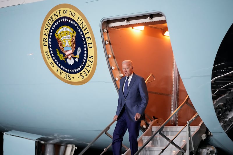 US President Joe Biden steps off Air Force One at Belfast International Airport in Northern Ireland on Tuesday. AP