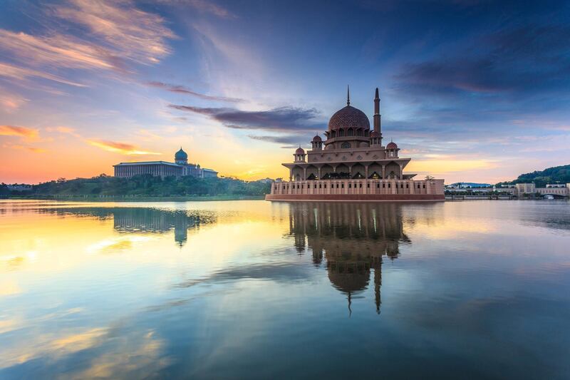 Tranquil sunrise view at of Masjid Putra located in Putrajaya, Malaysia.