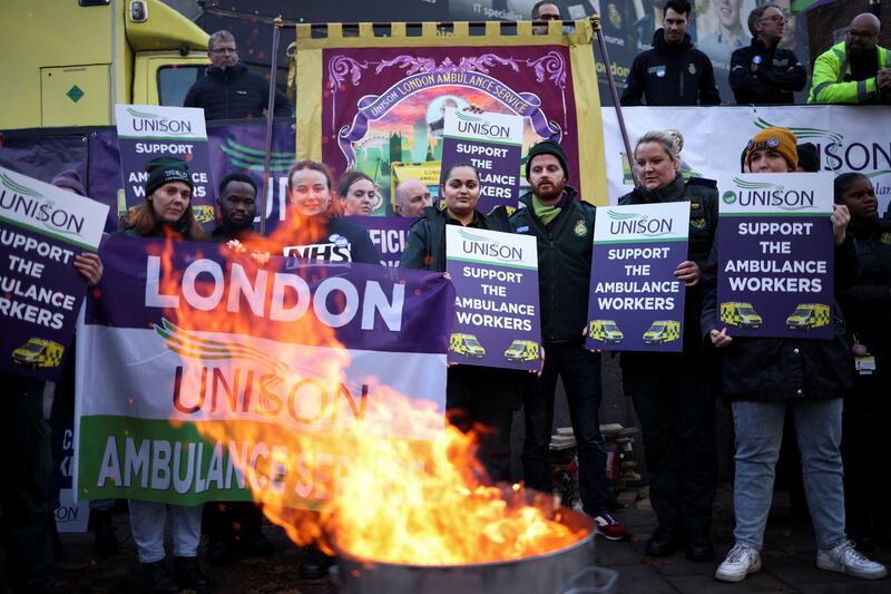 Striking ambulance workers outside the NHS London Ambulance Service HQ in London. Reuters