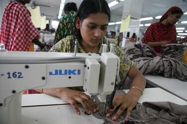 Workers sew clothing for a fast fashion retailer in Bangladesh. Nicole Hill/The National)