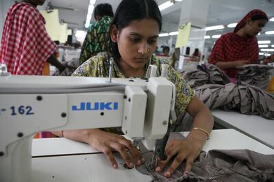 Dhaka, Bangladesh - June 14, 2008 - Workers sew H&M clothing at Sterling garment factory.  (Nicole Hill / The National) *** Local Caption ***  NH Bangladesh157.JPGFO13_BangledeshGarment14.JPG