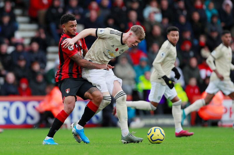 Manchester United's Scott McTominay battles with Bournemouth's Joshua King. Reuters