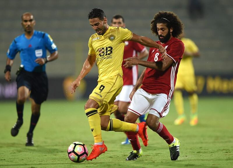 Helder Barbosa of Al Wasl and Adullah Ali Alnaqbi of Al Dhfra in action during the Arabia Gulf League match at Zabeel Stadium on September 24, 2016 in Dubai,. Tom Dulat / Getty Images 