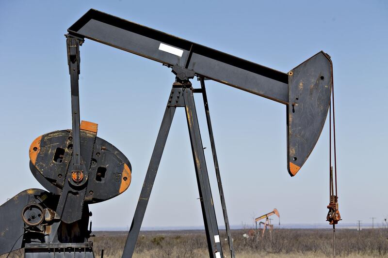 Pumpjacks operate on oil wells in the Permian Basin near Crane, Texas, U.S., on Friday, March 2, 2018. Chevron, the world's third-largest publicly traded oil producer, is spending $3.3 billion this year in the Permian and an additional $1 billion in other shale basins. Its expansion will further bolster U.S. oil output, which already exceeds 10 million barrels a day, surpassing the record set in 1970. Photographer: Daniel Acker/Bloomberg