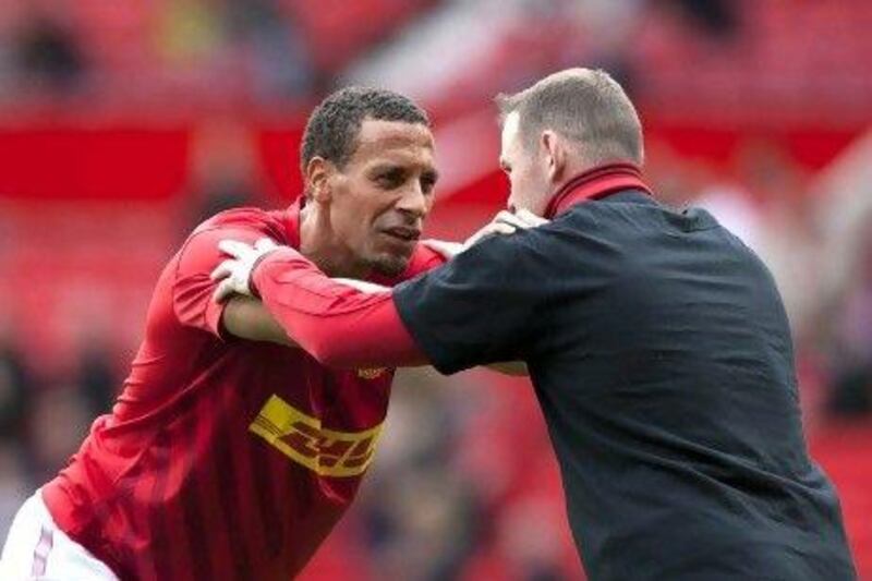 The columnist feels that Rio Ferdinand, left, remains a team player despite failing to observe orders in an anti-racism campaign.