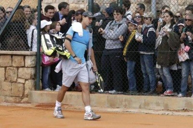 Rafael Nadal, above, is unabashed fan of Real Madrid, and Novak Djokovic has been a guest at Real's training facilities and the Bernabeu. That likely will not curry any favour among Barcelona supporters.