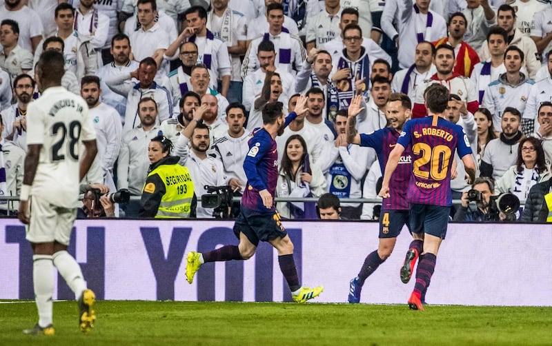 MADRID, SPAIN - MARCH 02: Ivan Rakitic of Barcelona celebrates after scoring his team's first goal with team mates during the La Liga match between Real Madrid CF and FC Barcelona at Estadio Santiago Bernabeu on March 2, 2019 in Madrid, Spain. (Photo by TF-Images/Getty Images)