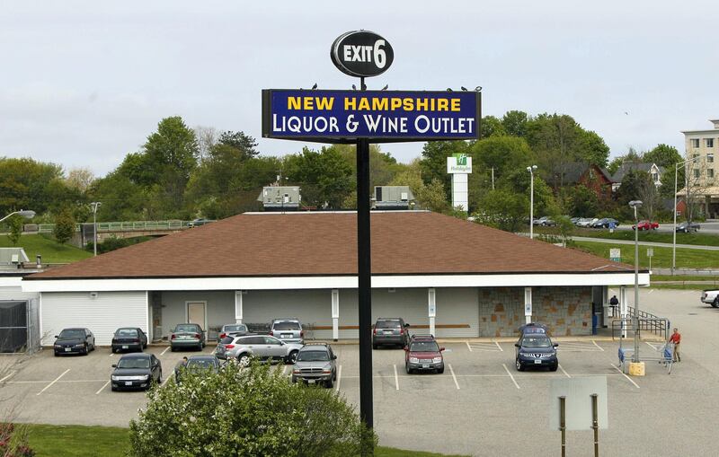 A state-run liquor store is seen just off Intersate 95 in Portmouth, N.H., Sunday, May 22, 2011. Some Maine lawmakers  say Maine's tax burdens make it tough to compete with New Hamsphire where there is no income or sales tax. (AP Photo/Robert F. Bukaty)