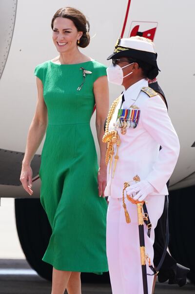 The Duchess of Cambridge borrowed the queen's hummingbird brooch for her departure from Jamaica on March 24, 2022. PA 