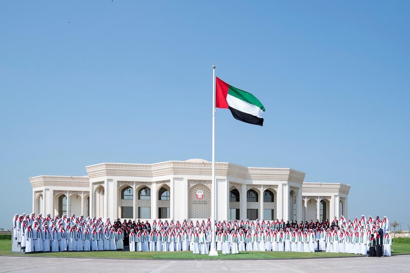 ABU DHABI, UNITED ARAB EMIRATES - November 03, 2019: HH Sheikh Theyab bin Mohamed bin Zayed Al Nahyan, Abu Dhabi Executive Council member and Chairman of the abu Dhabi Crown Prince Court (CPC) (front row C) stands for a photograph with CPC staff members during Flag Day celebrations, at Crown Prince Court. 

( Hamad Al Kaabi / Ministry of Presidential Affairs )​
---