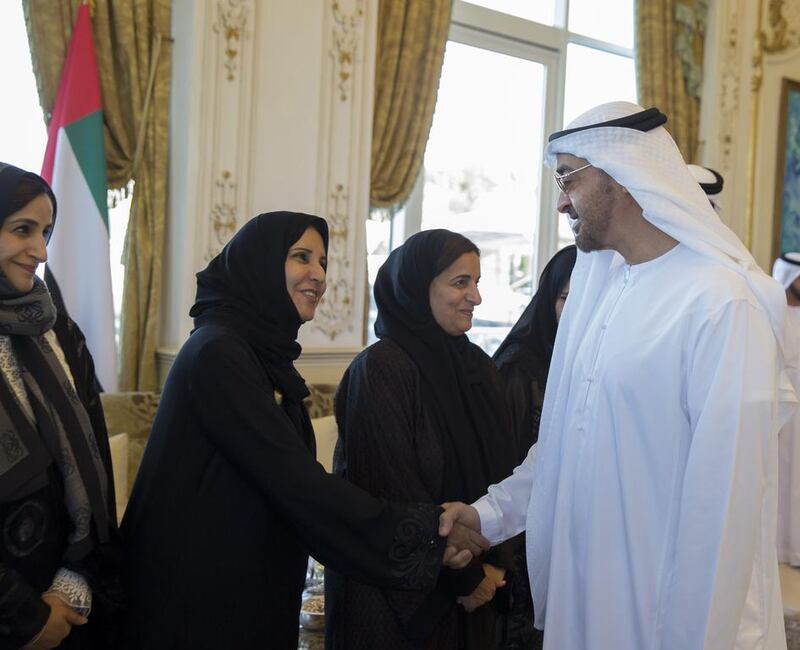 The Abu Dhabi Crown Prince greets Dr Maitha Al Shamsi, Minister of State (2nd L) on the occasion of Emirati Women’s Day, during a Sea Palace barza. Seen with Jameela Al Muhairi, Minister of State for Public Education (L) and Sheikha Lubna Al Qasimi, Minister of State for Tolerance (3rd L).  Mohamed Al Hammadi / Crown Prince Court - Abu Dhabi