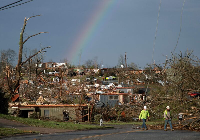 A rainbow shines after the tornado in Arkansas. AFP