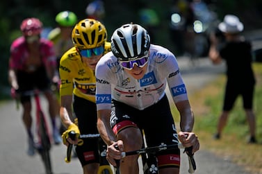 FILE - Slovenia's Tadej Pogacar, wearing the best young rider's white jersey, tries to break away from Denmark's Jonas Vingegaard, wearing the overall leader's yellow jersey, during the eighteenth stage of the Tour de France cycling race over 143. 5 kilometers (89. 2 miles) with start in Lourdes and finish in Hautacam, France, Thursday, July 21, 2022.  The 110th edition of the Tour de France starting Saturday, July 1, 2023 from Bilbao, Spain, will feature a mouthwatering duel between defending champion Jonas Vingegaard and two-time winner Tadej Pogacar.  (AP Photo / Daniel Cole, File)