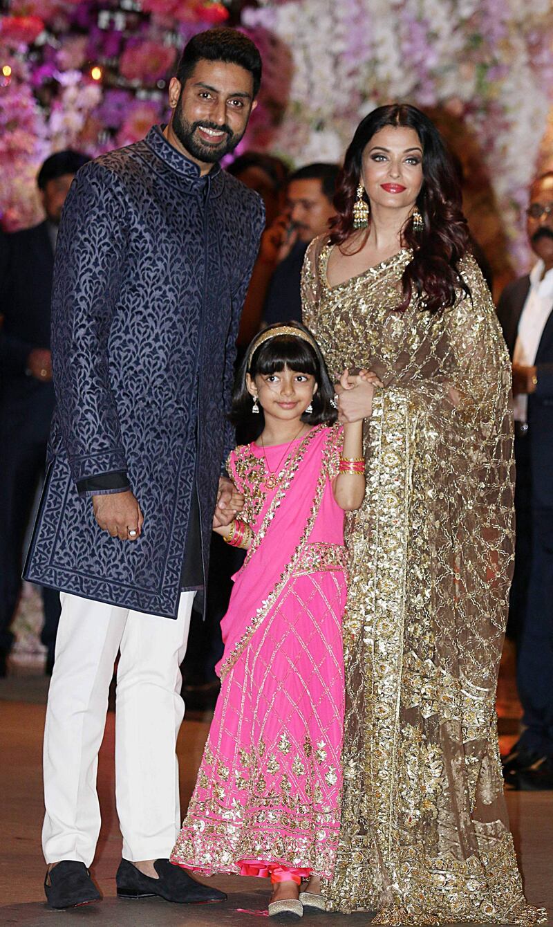 Abhishek Bachchan, Aishwarya Rai Bachchan and daughter Aaradhya pose for a picture at the engagement party of India's richest man and Reliance Industries Limited Chairman, Mukesh Ambani’s eldest son Akash Ambani and fiancee Shloka Mehta, in Mumbai on Saturday June 30, 2018. AFP