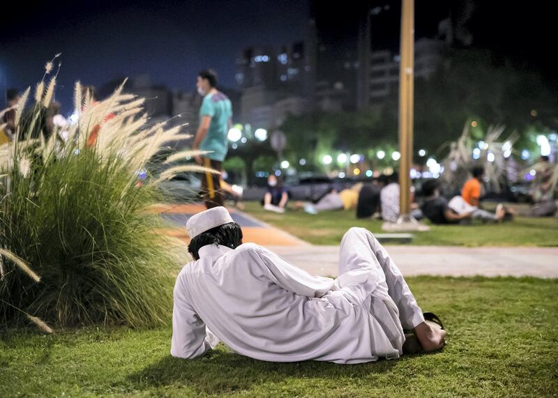 DUBAI, UNITED ARAB EMIRATES. 2 JUNE 2020. 
A man sits in a park by Dubai Creek in Baniyas, Deira.
(Photo: Reem Mohammed/The National)

Reporter:
Section: