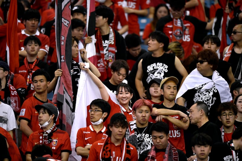 Urawa Red Diamonds fans inside the stadium before the match. Reuters