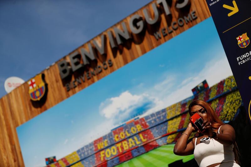 A visitor on the Barcelona FC tour takes a selfie inside the Camp Nou stadium before the coronavirus gripped Spain. Reuters