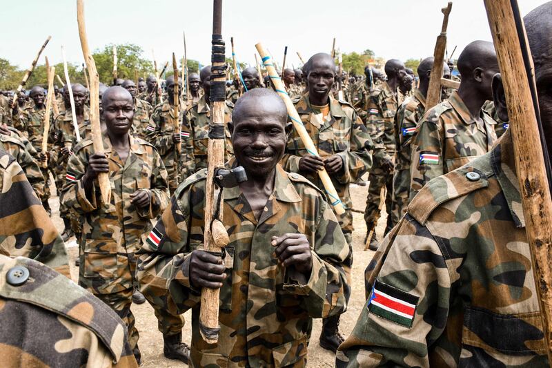 New members of South Sudan People's Defence Forces graduate in Malakal. About nine thousand fighters, including former rebels in the country's civil war, have been integrated into its armed forces. AFP