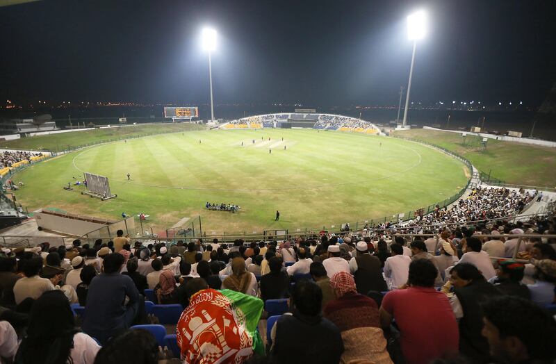 ABU DHABI , UNITED ARAB EMIRATES – Jan 16 , 2017 : Crowd watching the Desert T20 cricket tournament between UAE vs Afghanistan held at Zayed Cricket Stadium in Abu Dhabi. ( Pawan Singh / The National ) For Sports. Story by Paul Radley. ID No - 57770 *** Local Caption ***  PS1601- CRICKET15.jpg