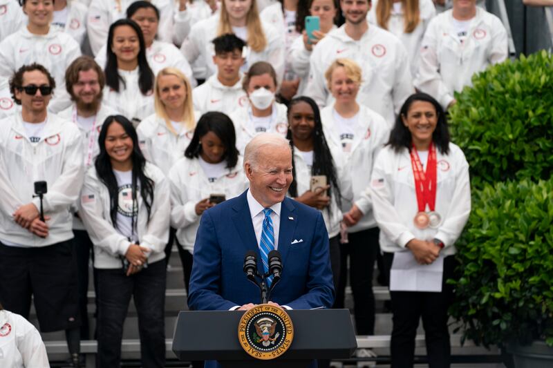 President Joe Biden with US Olympic and Paralympic athletes at the White House. AP