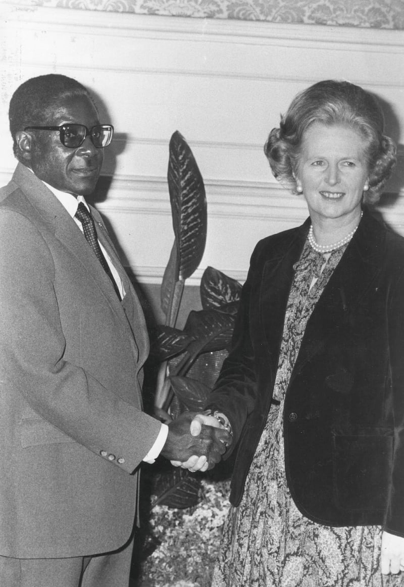 African nationalist and Zimbabe's first prime minister Robert Gabriel Mugabe meeting British prime minister Margaret Thatcher at No 10 Downing Street, en route to President Tito's funeral in Yugoslavia.  Original Publication: People Disc - HN0598   (Photo by Evening Standard/Getty Images)