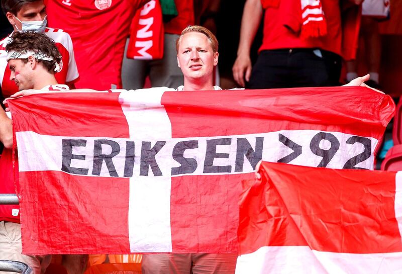 Denmark fans cheer their team in Amsterdam. PA