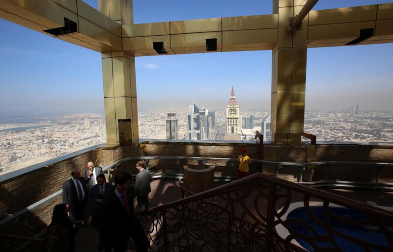 Visitors are seen at the 71st floor of the Gevora Hotel, the world's tallest hotel, in Dubai, UAE February 12, 2018. REUTERS/Satish Kumar
