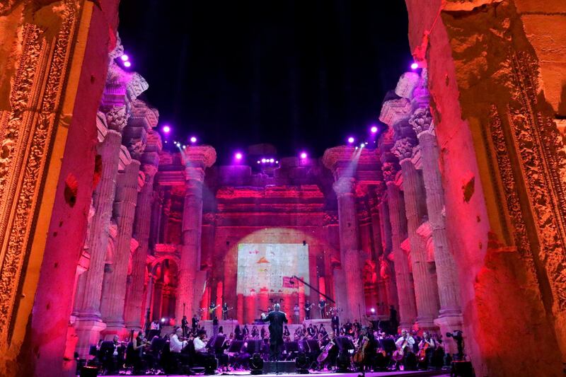 Maestro Harout Fazlian conducts rehearsals ahead of the Sound of Resilience concert inside the Temple of Bacchus at the historic site of Baalbek in Lebanon's eastern Bekaa Valley. A philharmonic orchestra performed to spectator-free Roman ruins in east Lebanon, after a top summer festival downsized to a single concert in a year of economic meltdown and COVID-19 pandemic. The Baalbek International Festival was instead beamed live on television and social media, in what its director called a message of "hope and resilience" amid ever-worsening daily woes. AFP