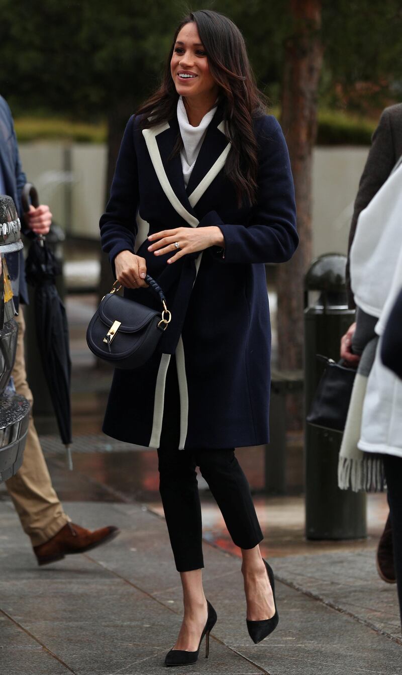 BIRMINGHAM, ENGLAND - MARCH 08:  Meghan Markle arrives with Prince Harry (not pictured) in Birmingham on March 8, 2018 in Birmingham, England.  (Photo by Hannah McKay-WPA Pool/Getty Images)